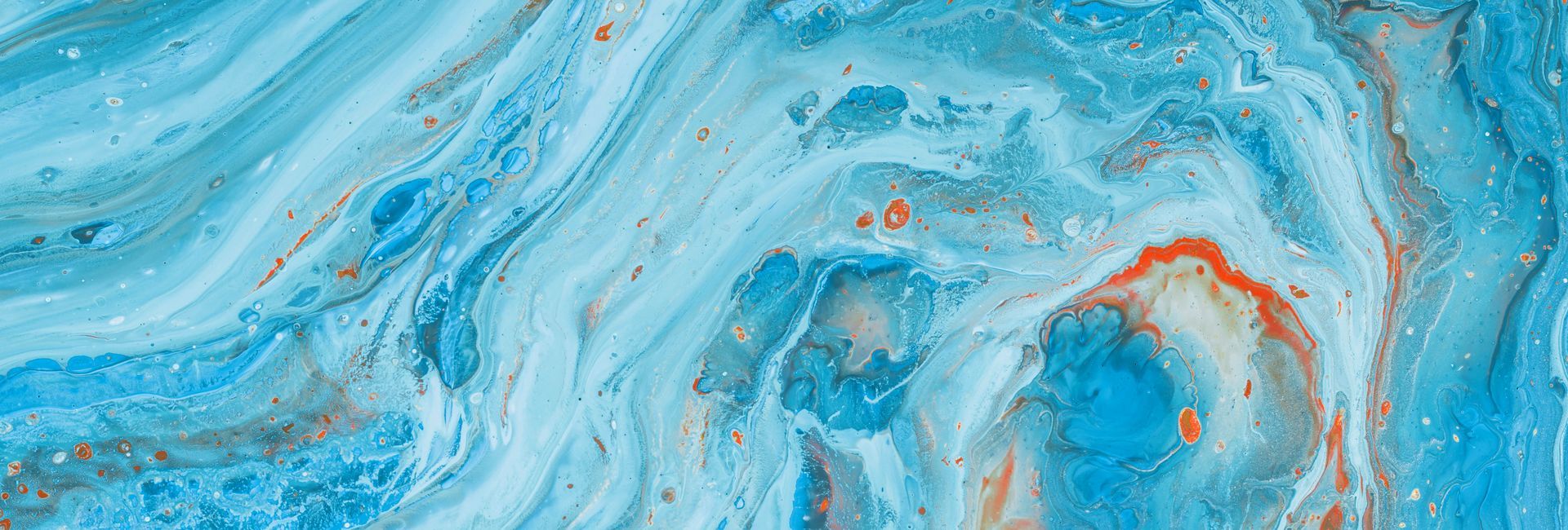 Abstract fluid art design with swirling shades of blue and orange, creating a modern and dynamic background.